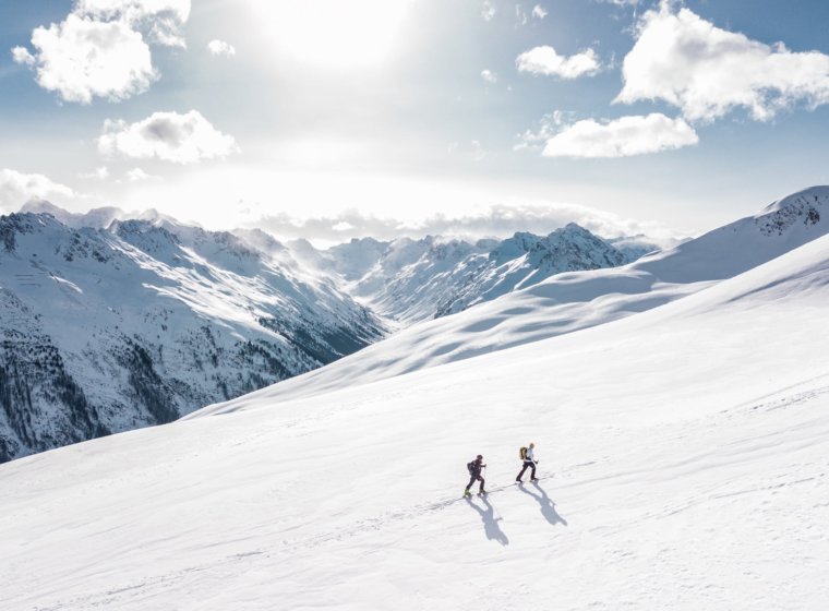 Two skiers ski-touring