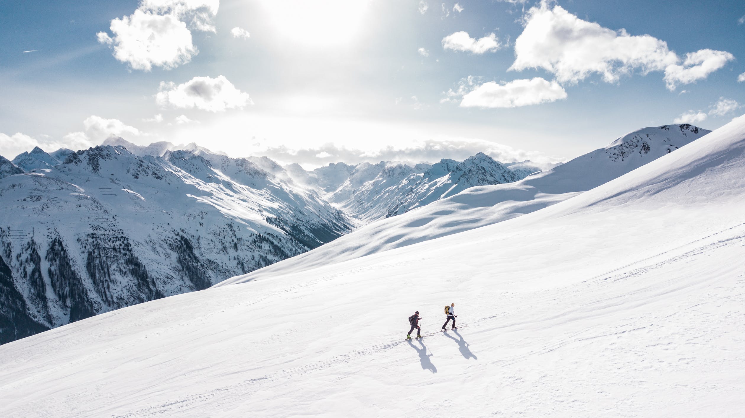 Two skiers ski-touring